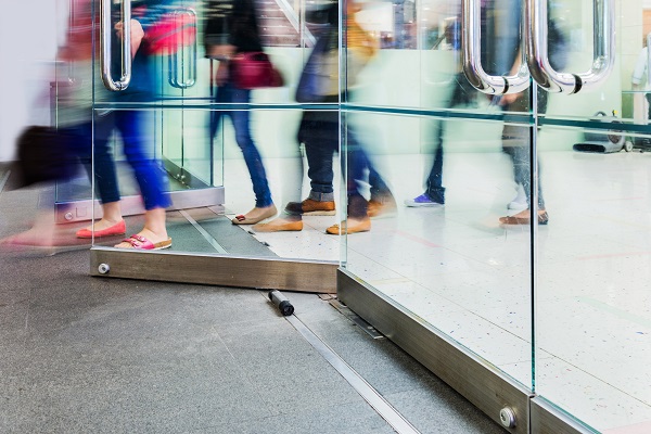 people leaving a business building